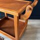 Vintage wooden trolley on wheels
