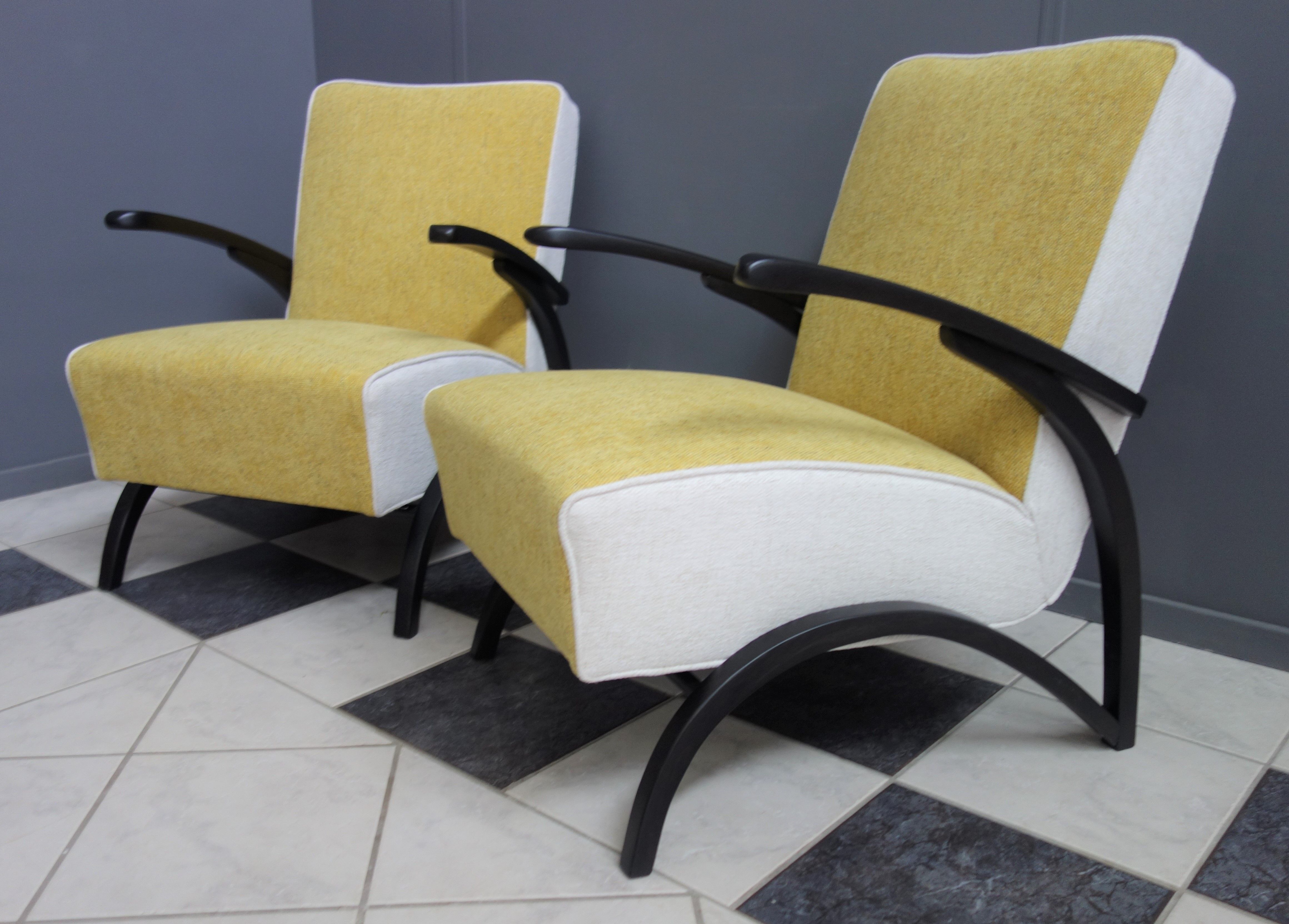 Jindrich halabala chairs yellow and white
