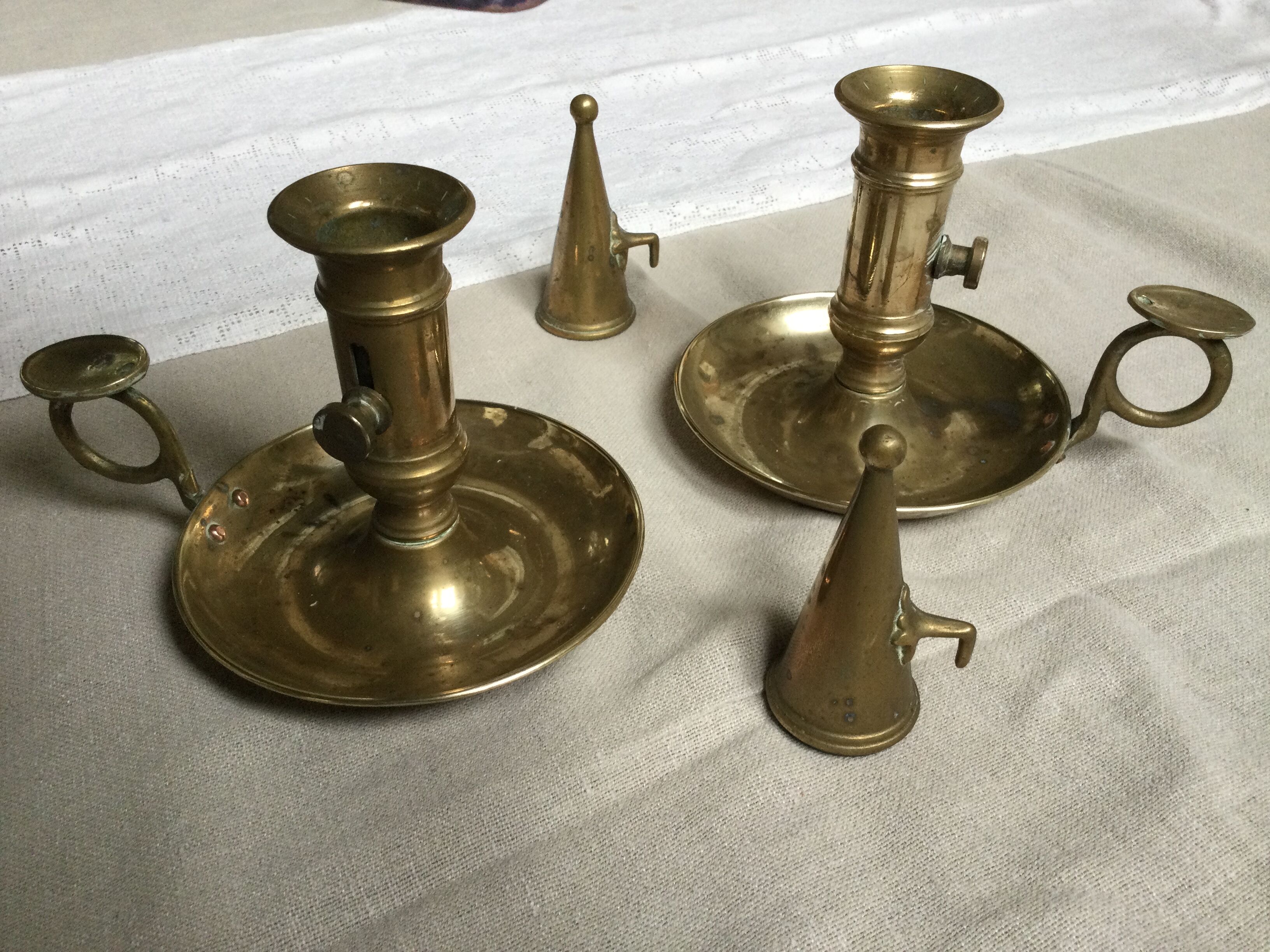 Pair of antique copper candle holders