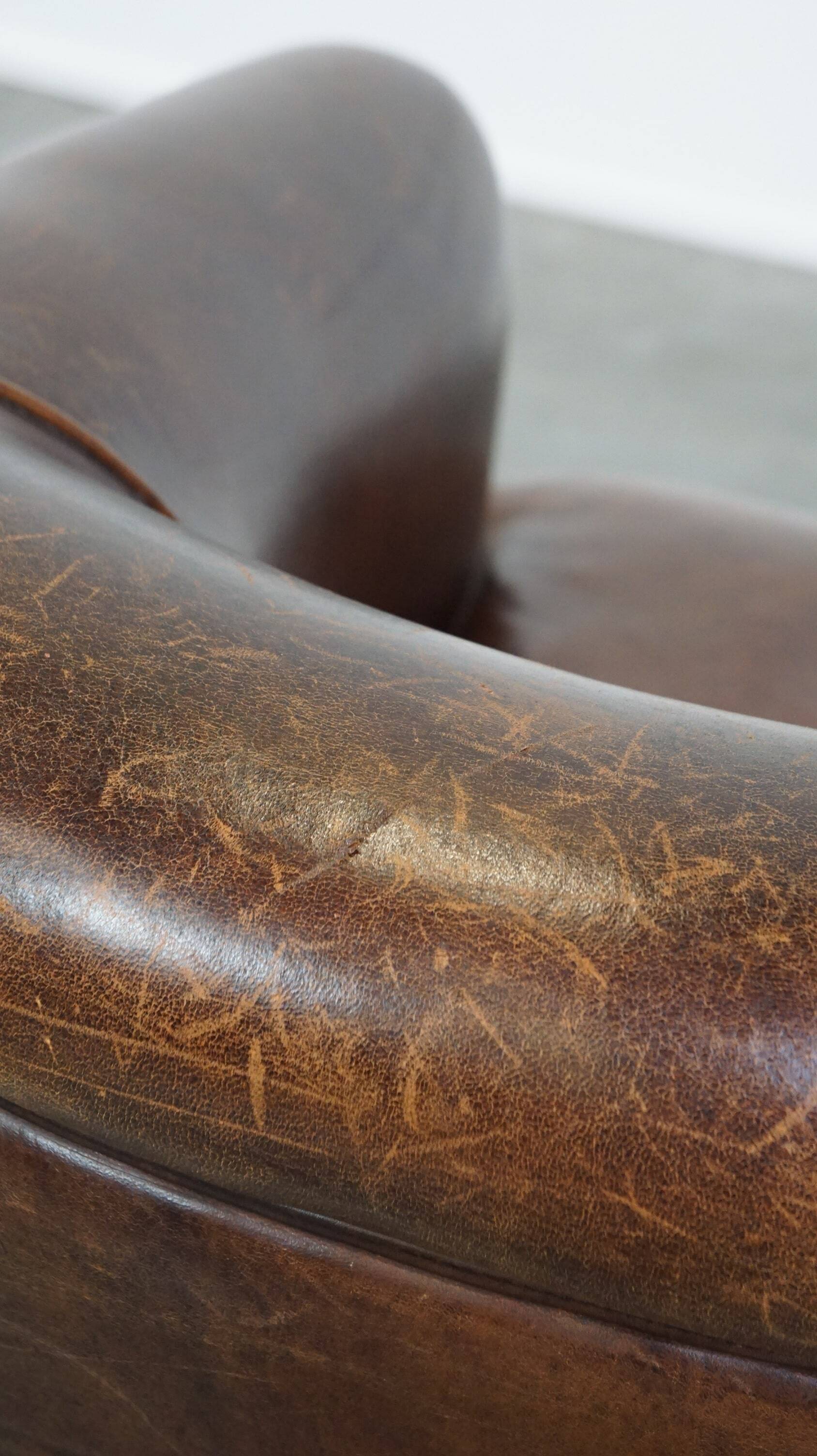 English style sheep leather club chair finished with decorative nails