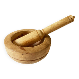 Old turned wooden pestle and mortar