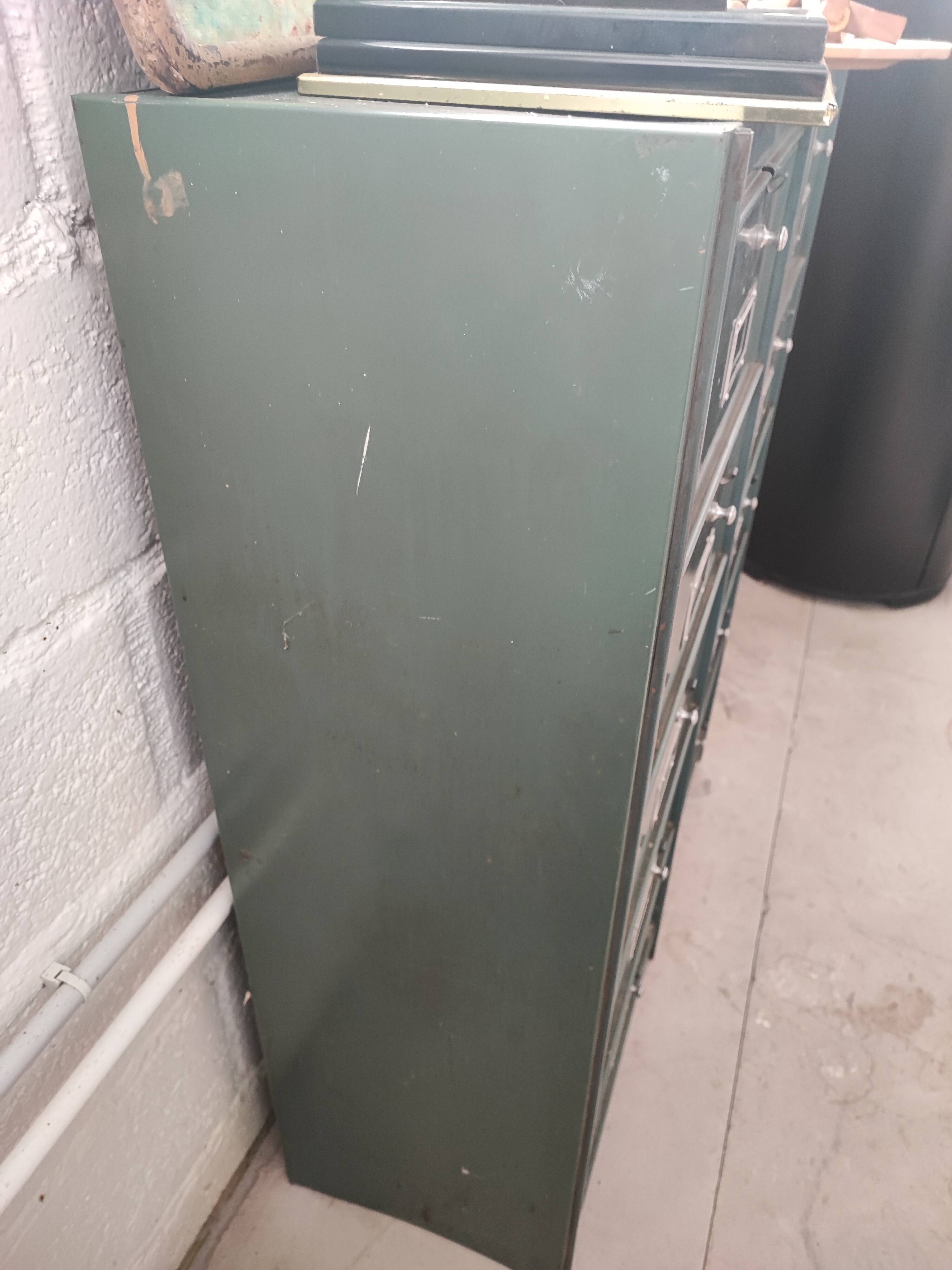 10-compartment metal locker with hinged door from the 50s
