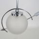 Suspension in chromed metal and glass, space age, arrow crossing a globe. Seventies