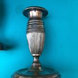 Pair of Louis XVI style candlesticks in silvered bronze