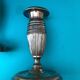 Pair of Louis XVI style candlesticks in silvered bronze