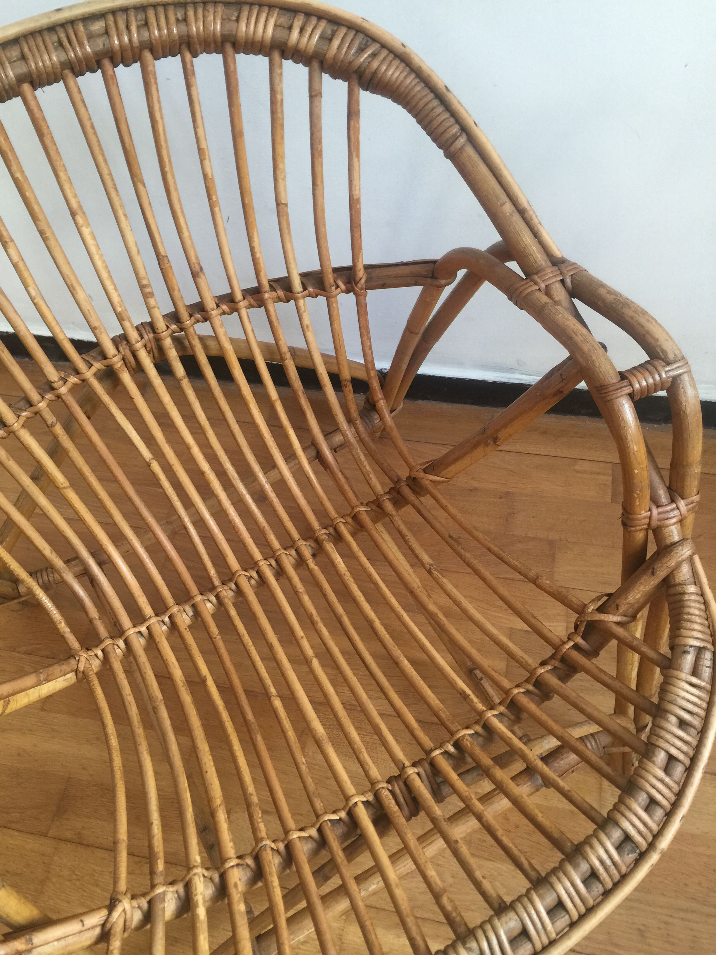 Shell rattan armchair