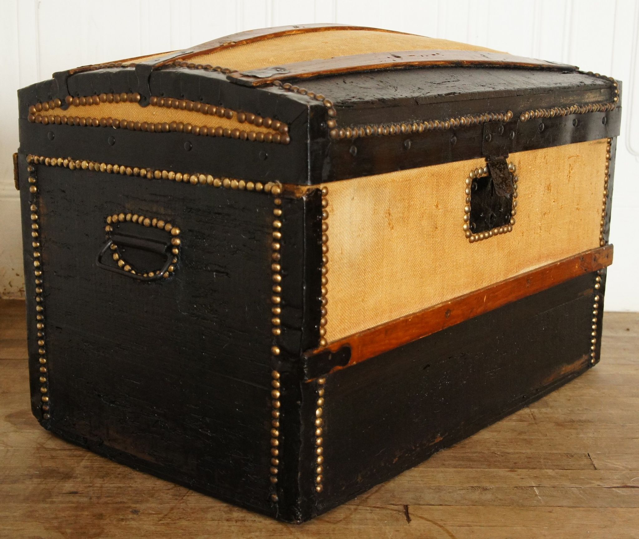 Old-curved wooden trunk - burlap