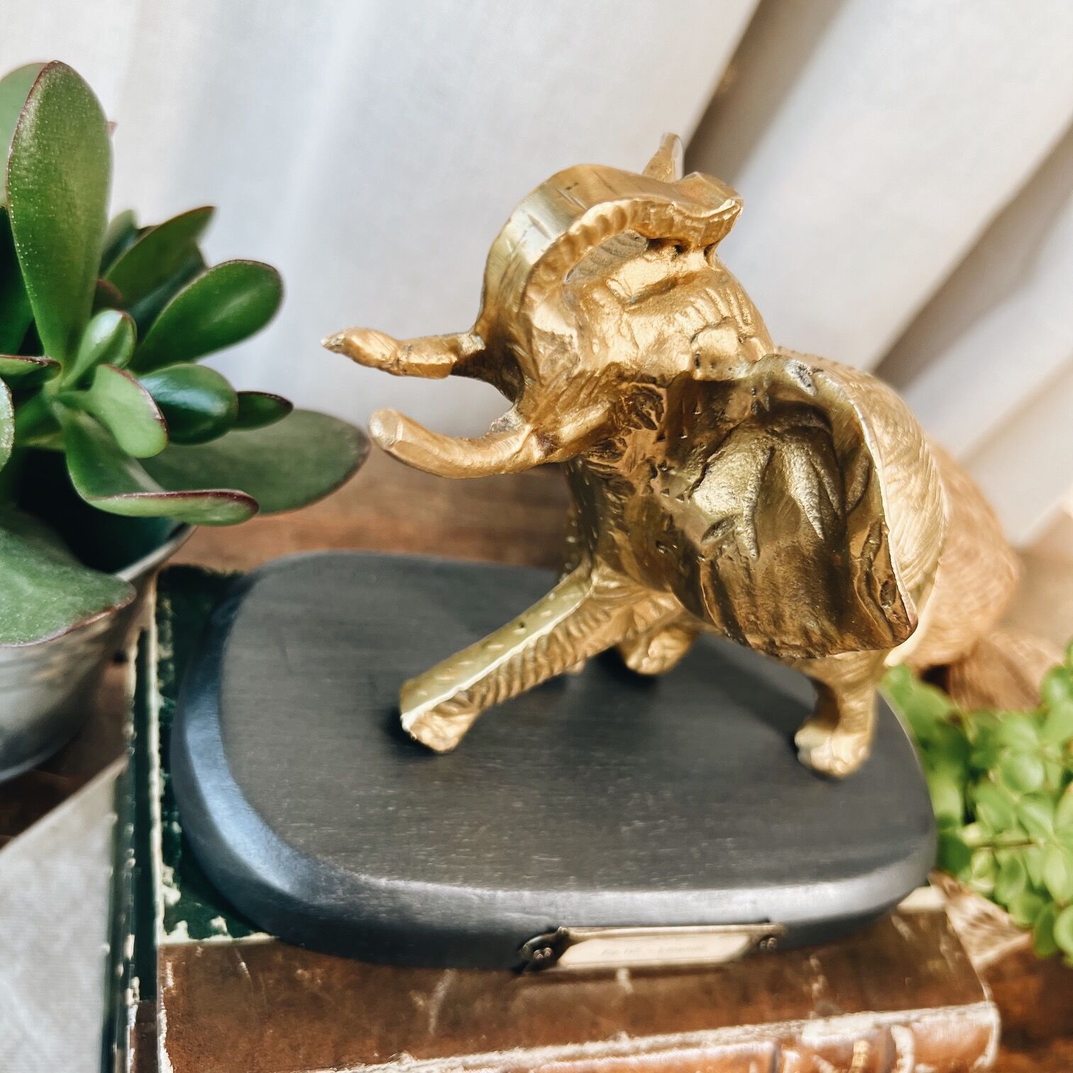 Bronze elephant on pedestal
