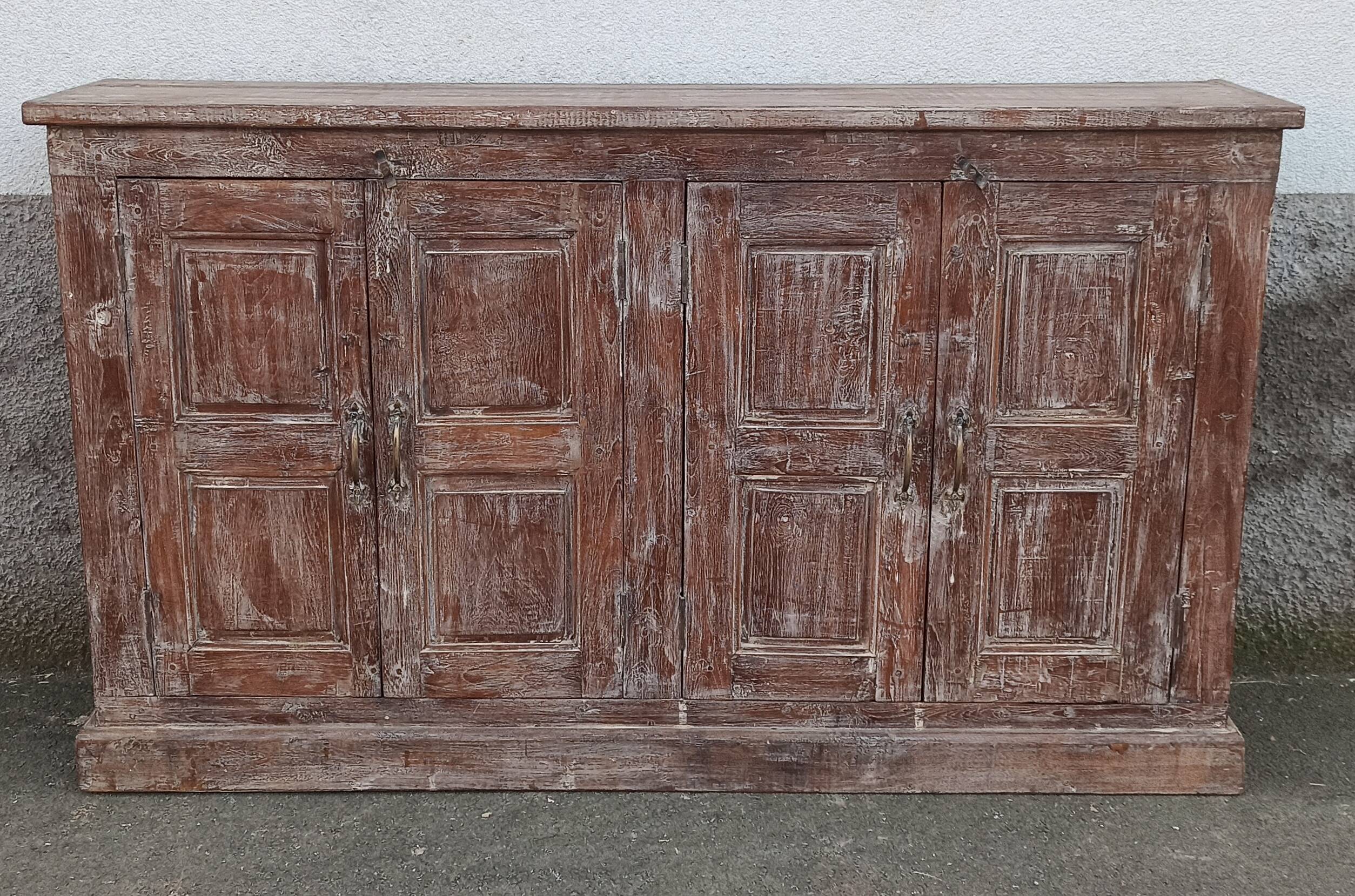 Old wooden sideboard with 4 doors