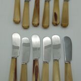 Twelve vintage butter knives
