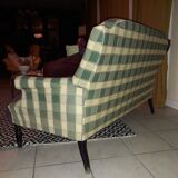Fully retaped green checkered sofa