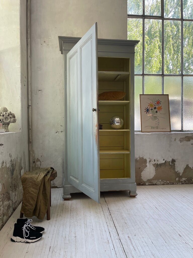 Blue patinated cap cabinet