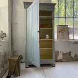 Blue patinated cap cabinet