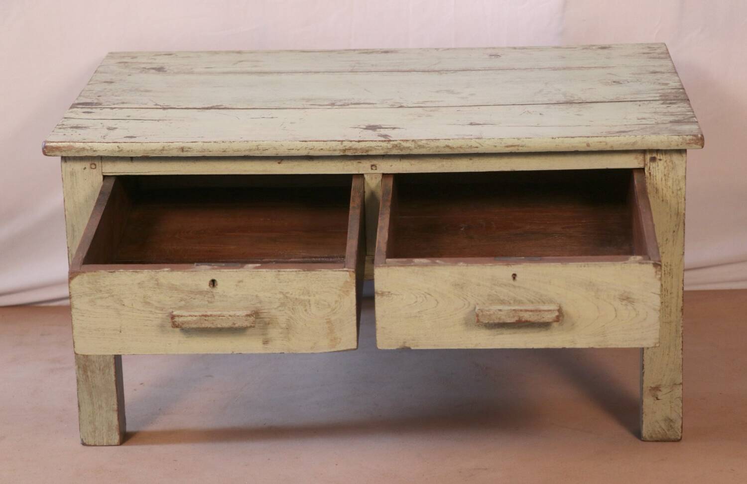 Antique bedside table in Burmese teak with original green cream patina.