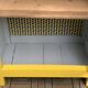Antique powder yellow Parisian bonnetière wardrobe.