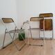 Trio de chaises pliantes en plexiglas
