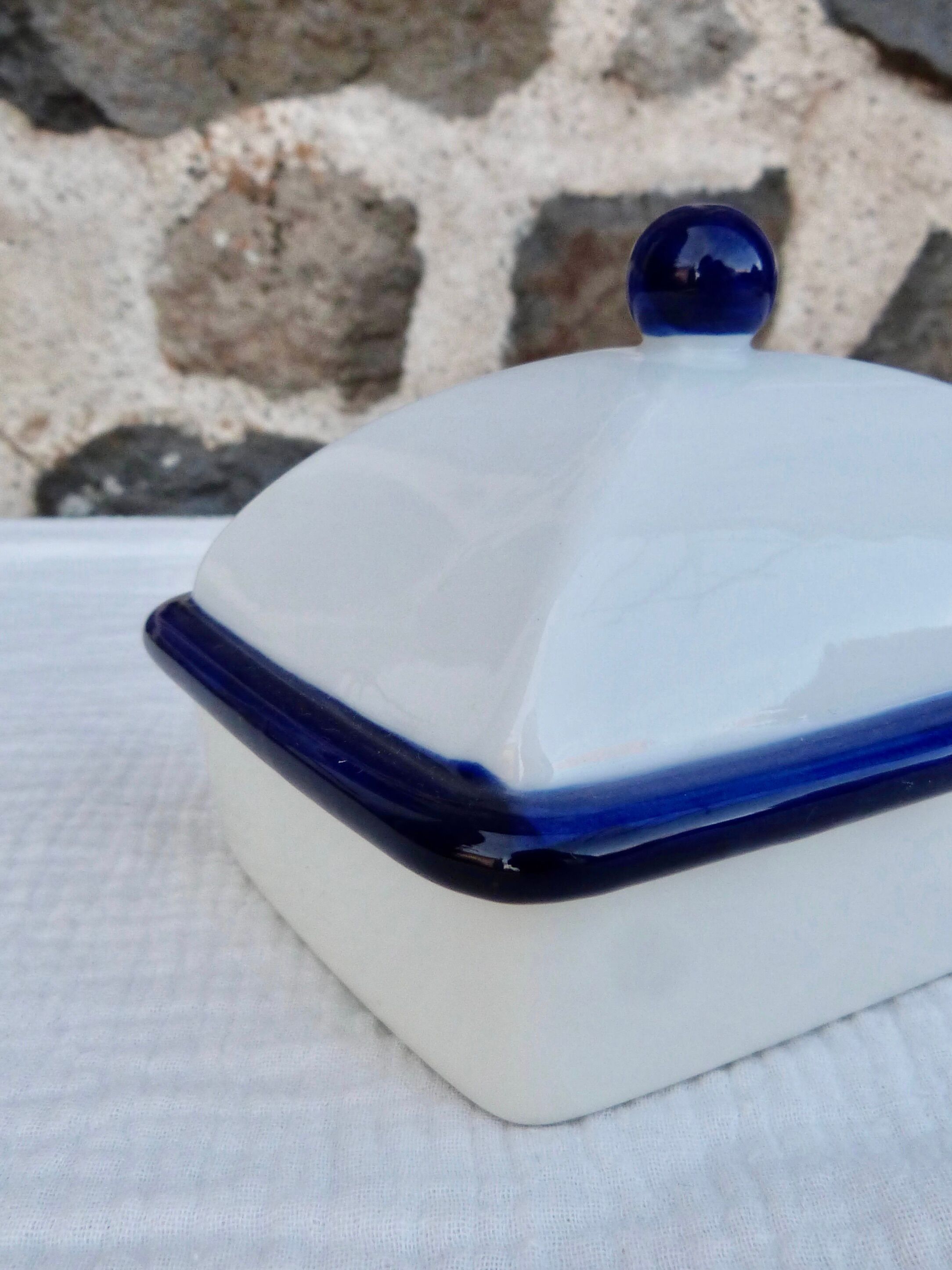 White and blue ceramic butter dish