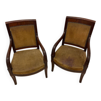 Pair of mahogany armchairs from the Empire period (19th century)