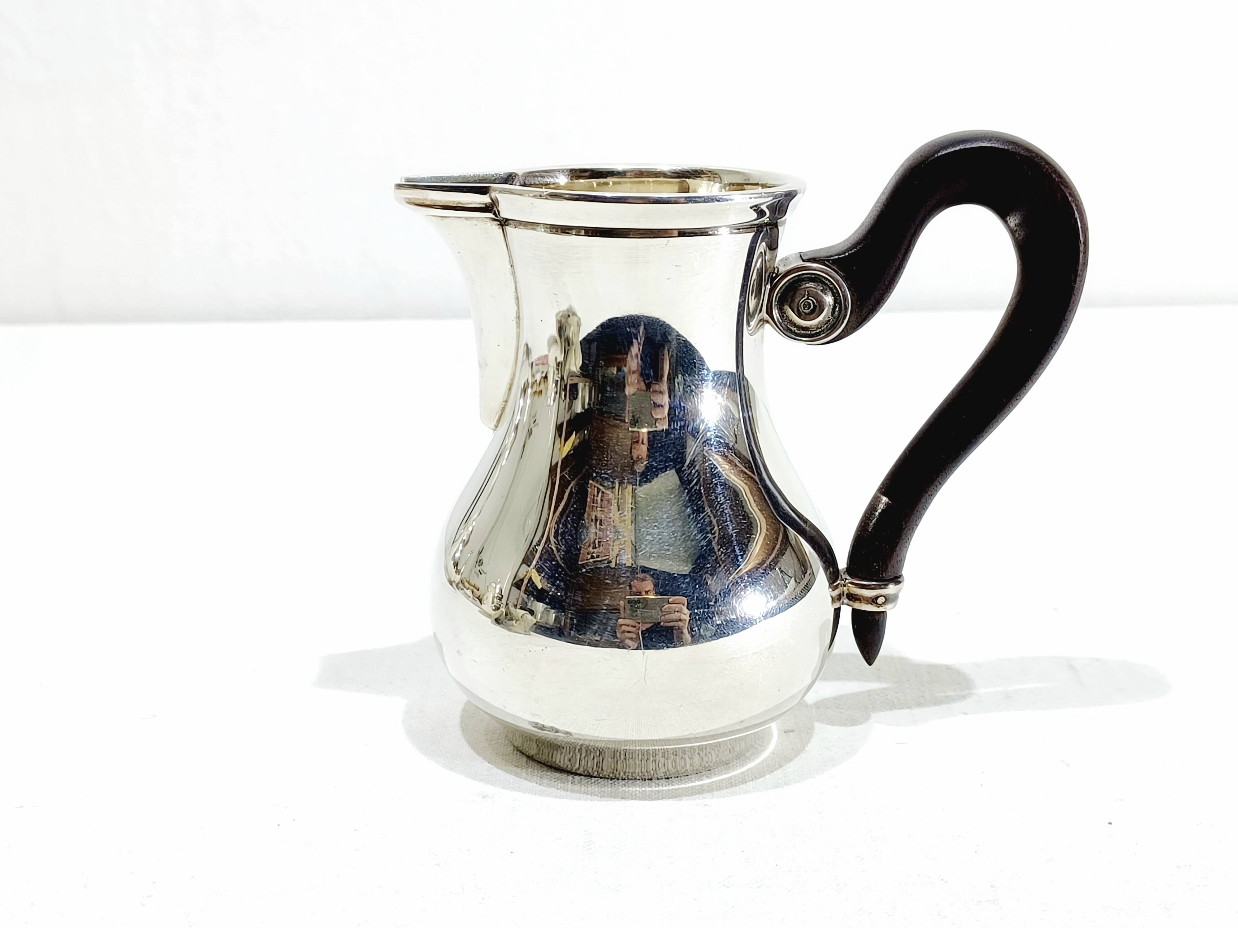 3-piece silver and ebony tea set