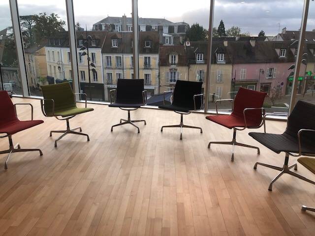 7 armchairs, 1 Charles & Ray Eames chair
