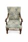 Empire armchair in carved wood and floral fabric