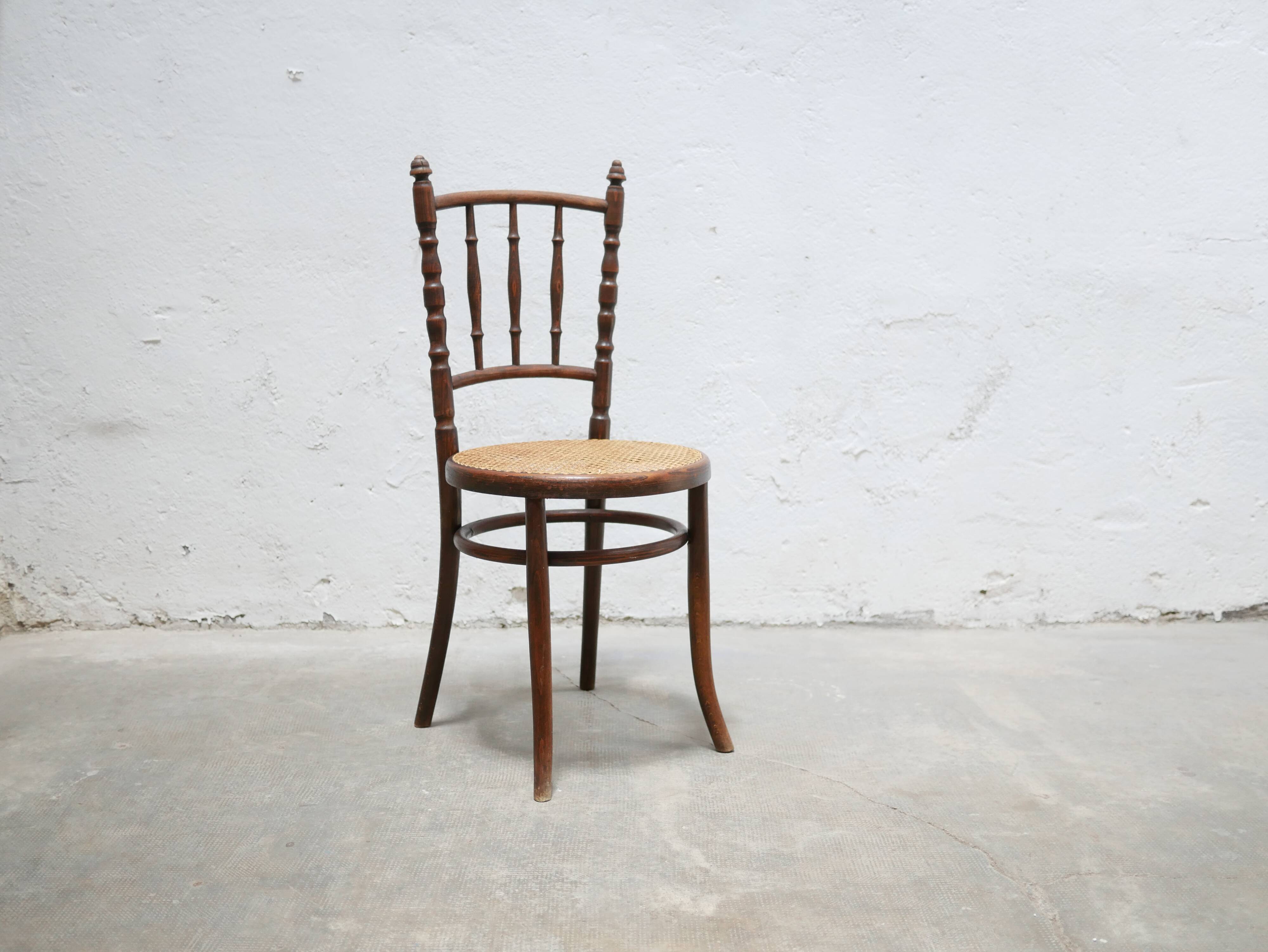 Old wooden cane bistro chair by Fischel editions