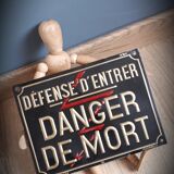 Plate embossed trespassing