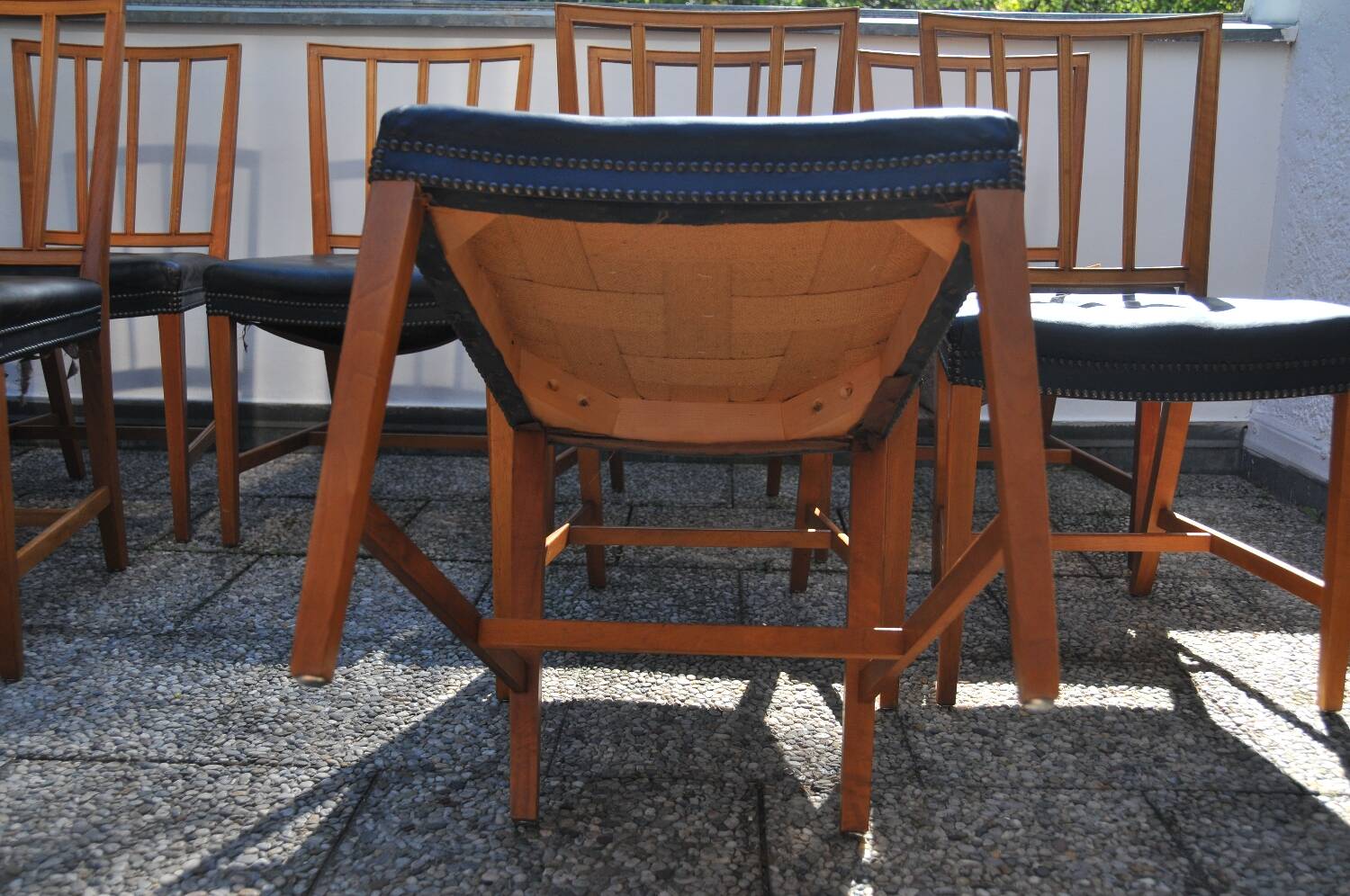 10 antique Josef Frank model 620 chairs in walnut wood from Svenskt Tenn.
