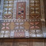 Handmade rectangular oriental rug dating from the 1960s in 100% wool