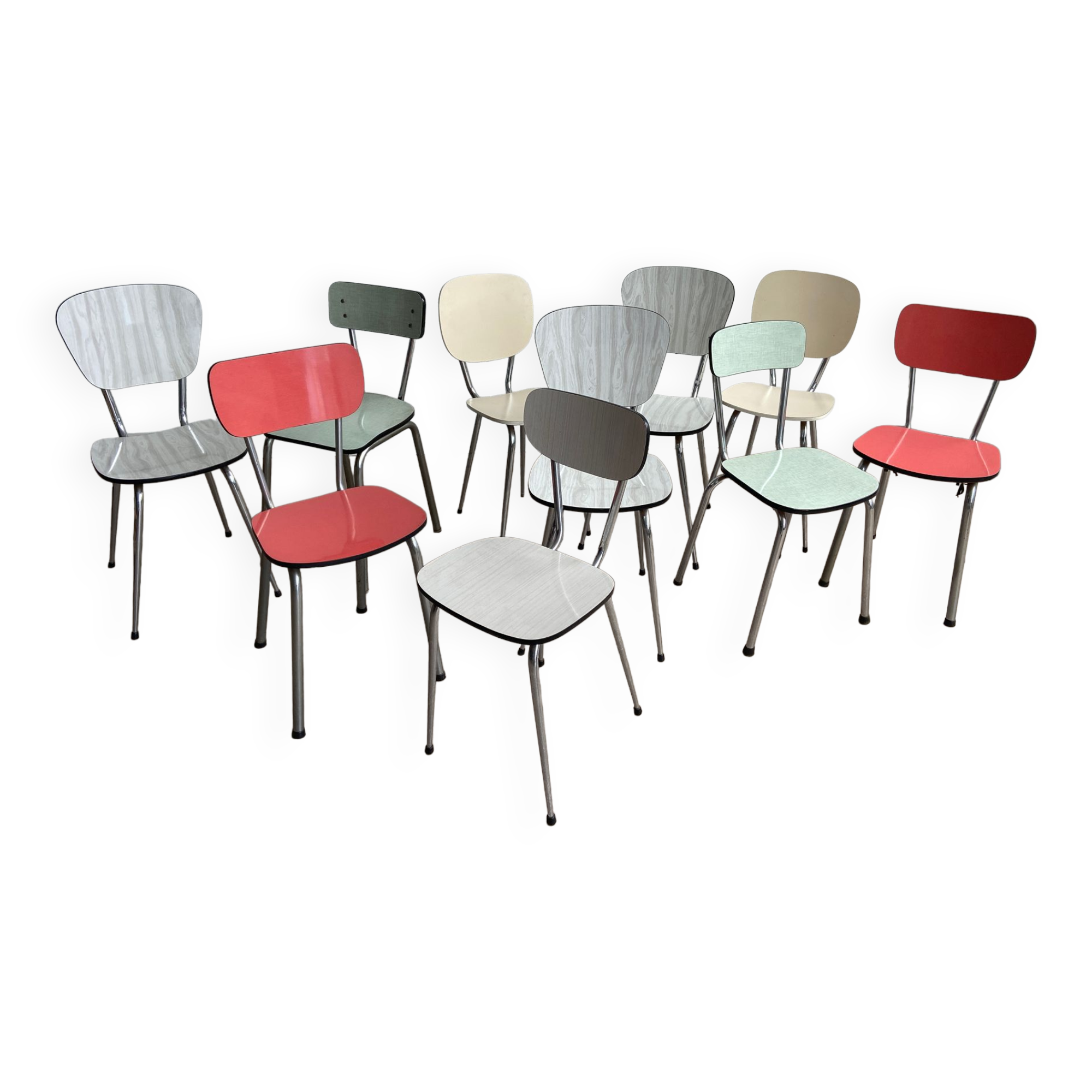 10 mismatched multicolored Formica chairs 60s