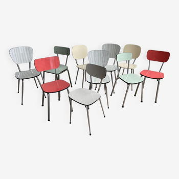 10 mismatched multicolored Formica chairs 60s