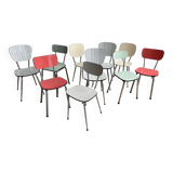 10 mismatched multicolored Formica chairs 60s