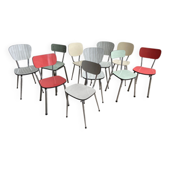 10 mismatched multicolored Formica chairs 60s