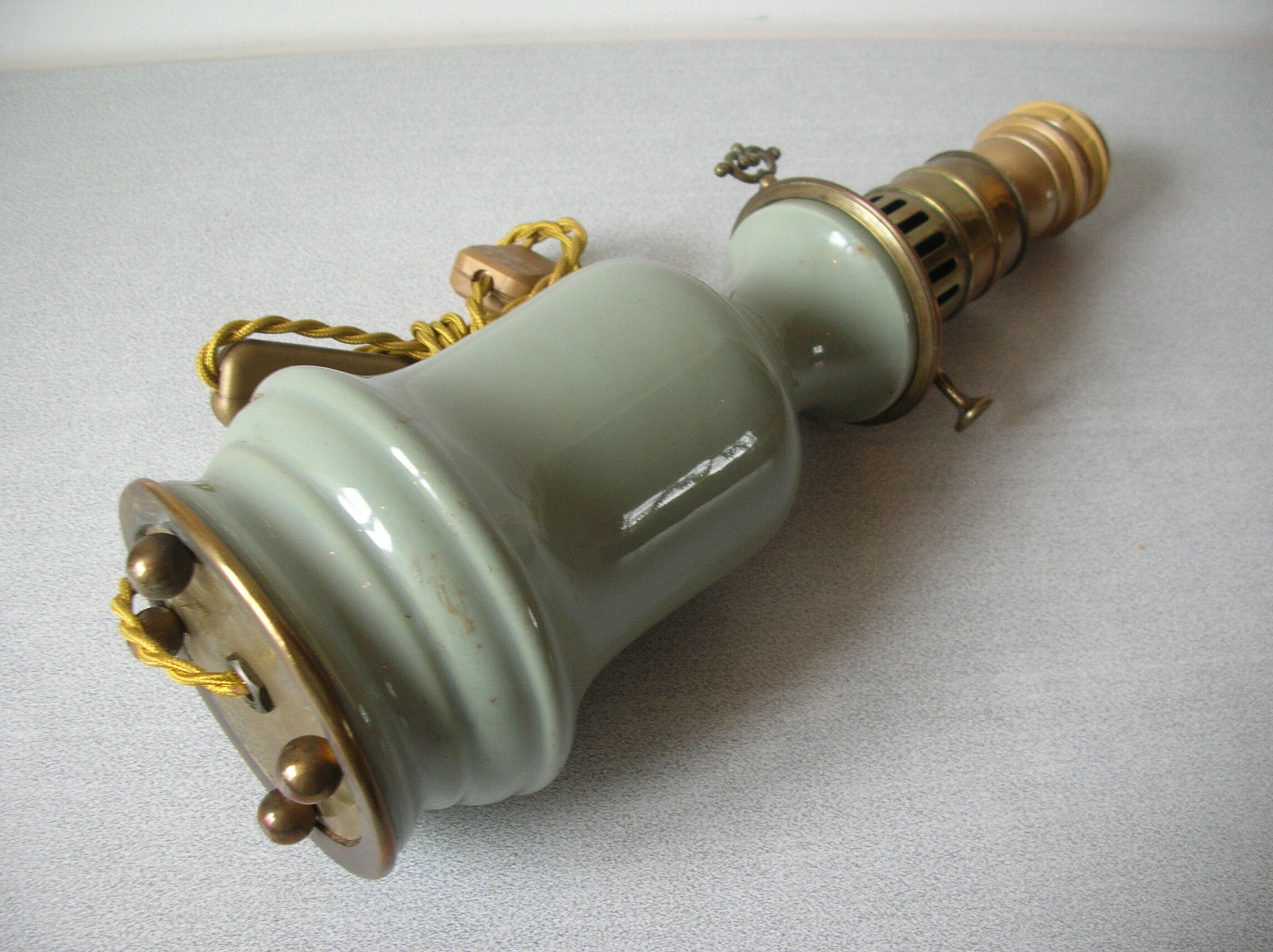 Old ceramic lamp foot and brass electric wire golden cord night light