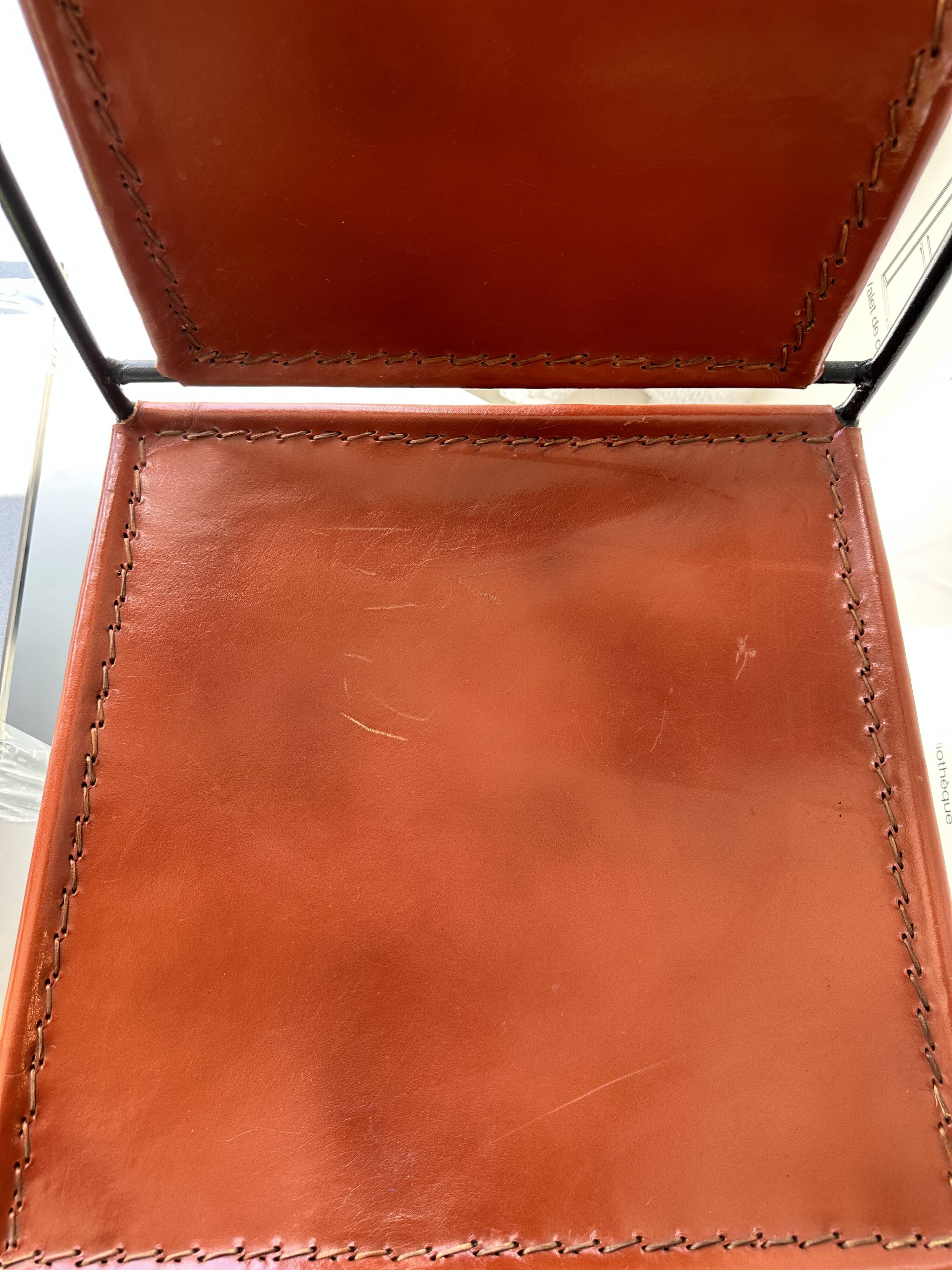 Chair in leather and wrought iron