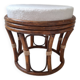 Rattan and boucle fabric pouf