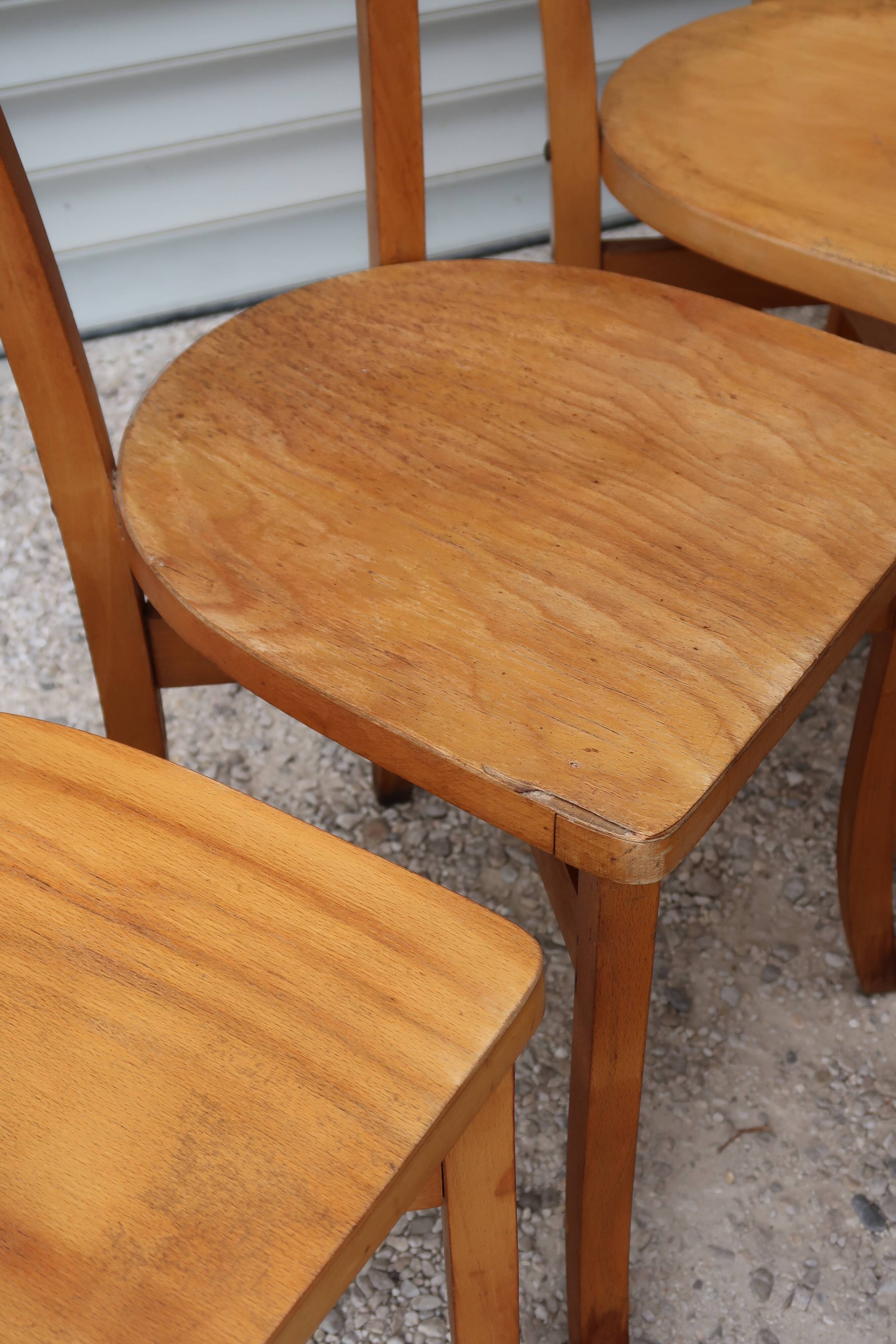 Set of 7 mismatched bistro chairs