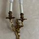3 gold wall sconces in Louis XV style, rocaille.