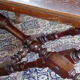 Foldable coffee table in solid oak and turned legs