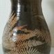 Vintage enamelled ceramic vase decorated with ferns