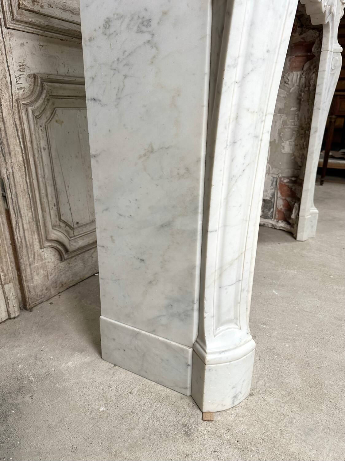 Louis XV style fireplace in white marble