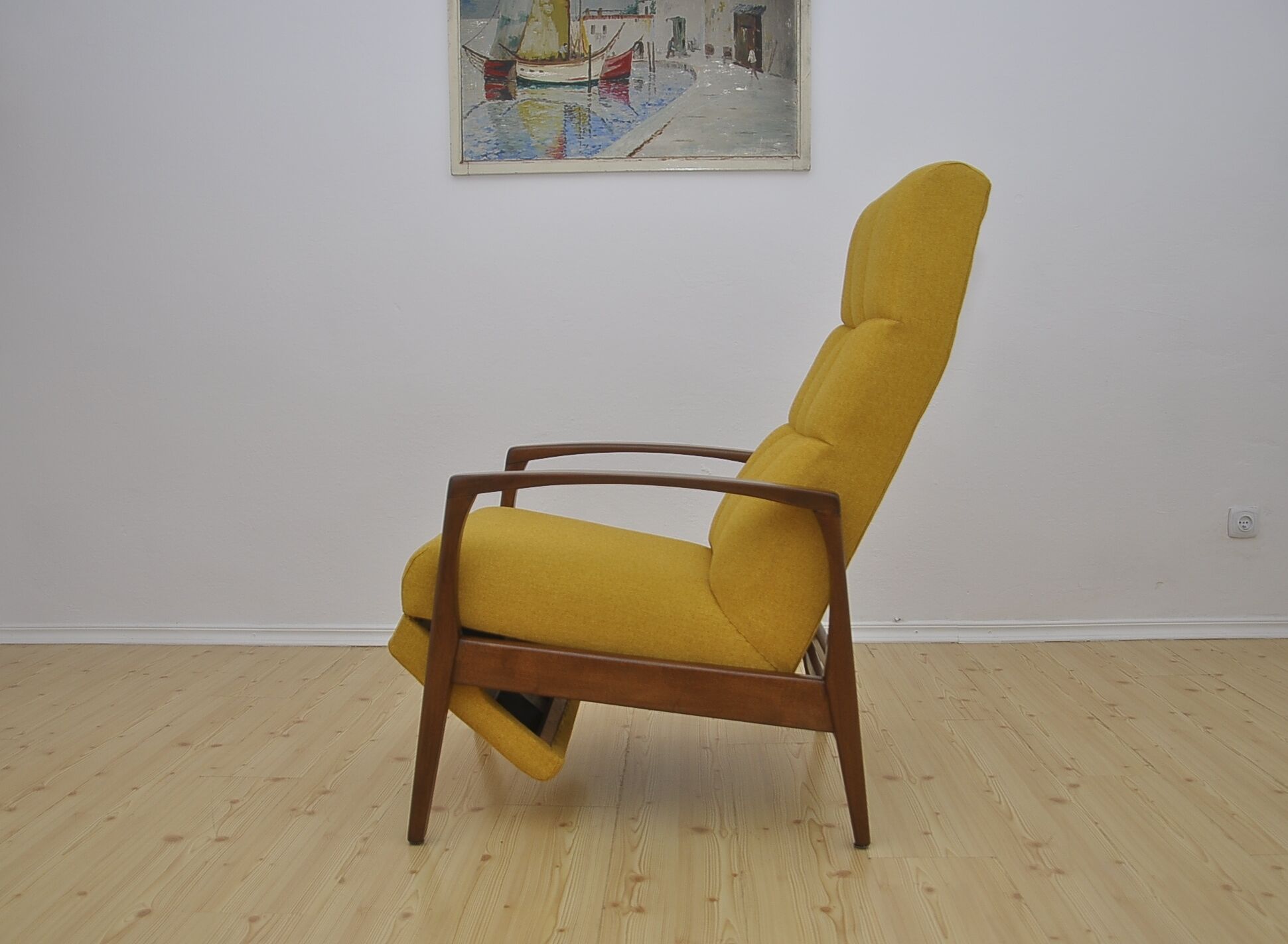 Mid-century armchair with folding footrest, 1960s
