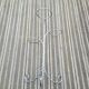 Plant holder: grey wrought iron tripod