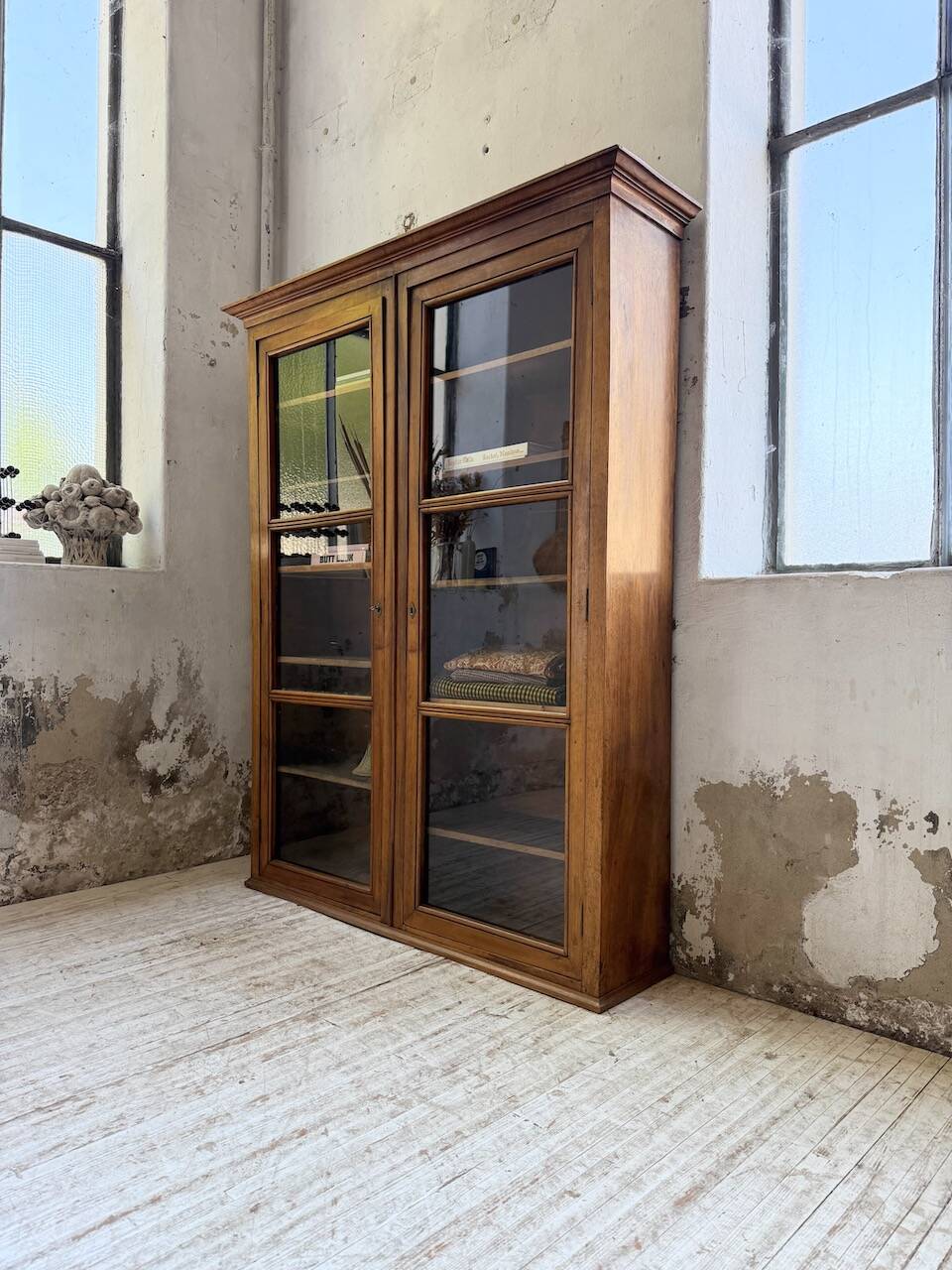 Glass-fronted walnut library 1900