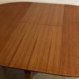 Scandinavian round teak dining table from the 60s extendable