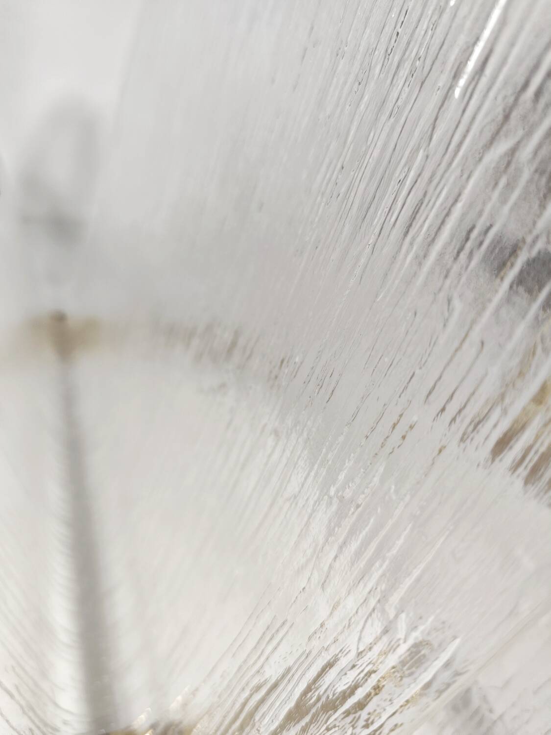 Revistero de metacrilato y latón. España, 1980s.