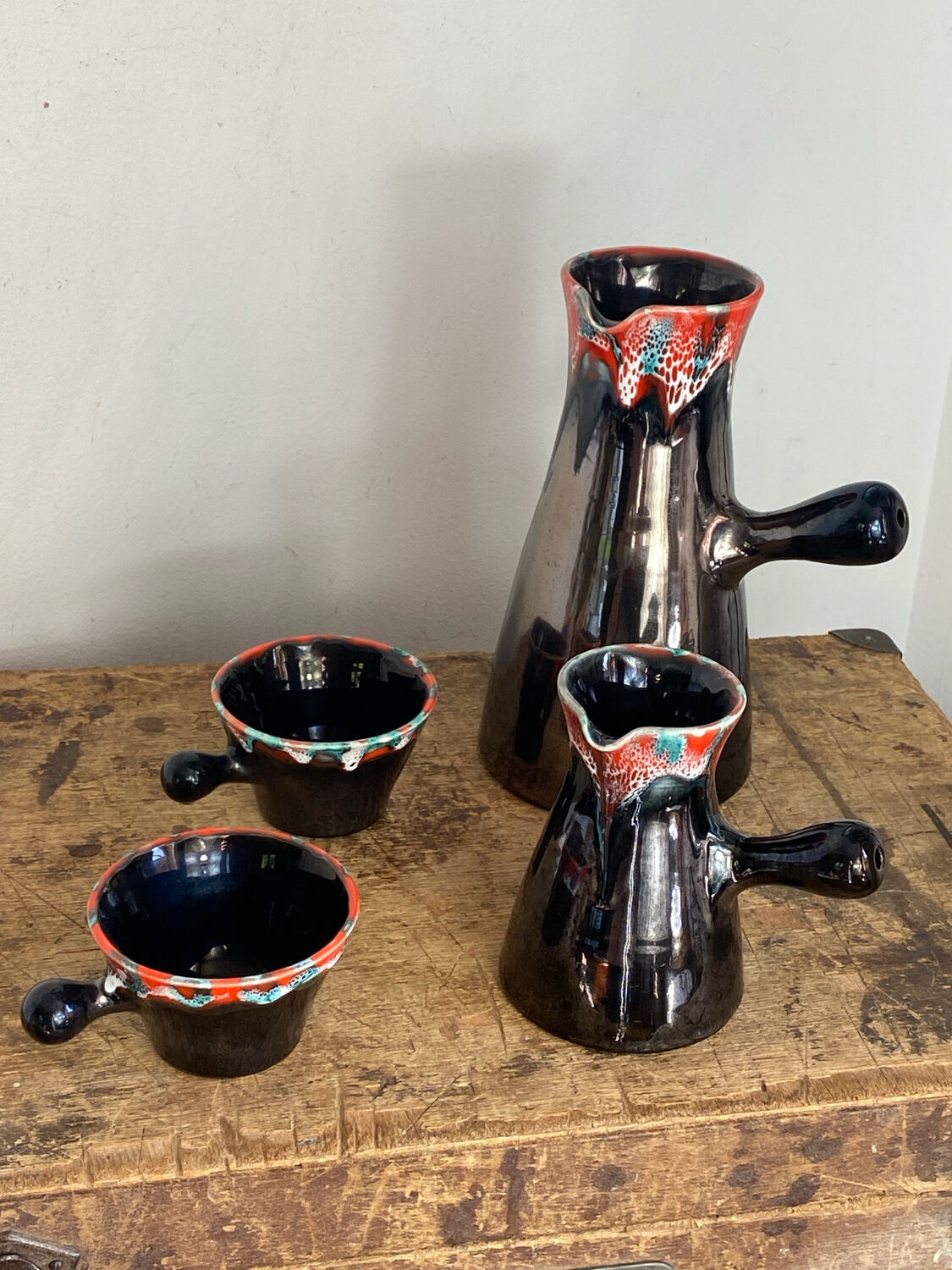 Pitchers and cups, iridescent ceramic, Vallauris