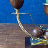 Pair of Art Deco candlesticks in brass and varnished wood, 1930s/1940s