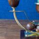Pair of Art Deco candlesticks in brass and varnished wood, 1930s/1940s