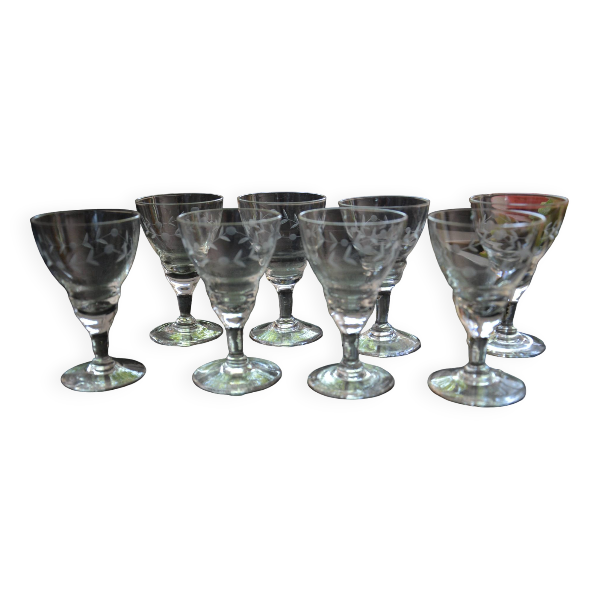 8 small old chiseled glasses